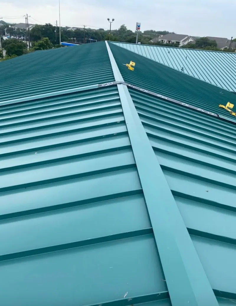 Green commercial metal roof ridge and valley for Metal Roof Repair in Murraysville